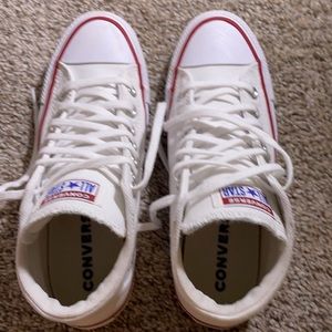 Women’s converse tennis shoe.